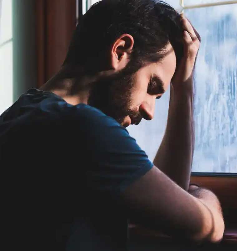 Young man stressed - drug and alcohol addiction among males concept